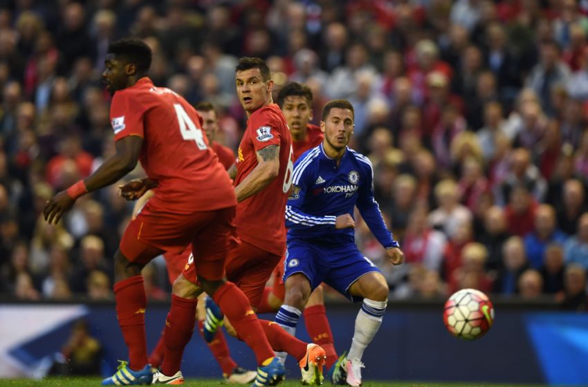 -bound shot as Liverpool's Ivorian defender Kolo Toure (L), Liverpool ...