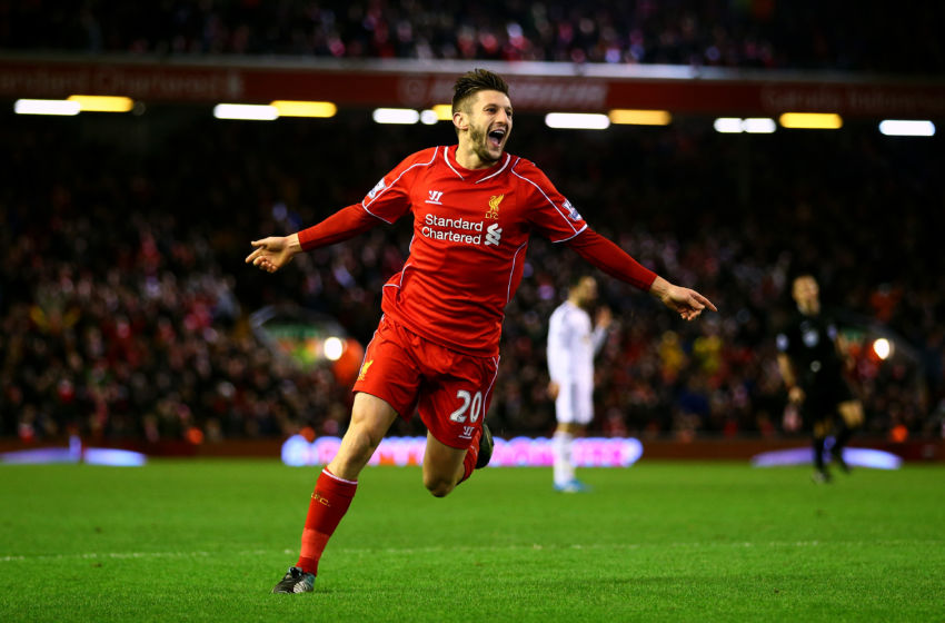 LIVERPOOL, ENGLAND - DECEMBER 29: Adam Lallana of Liverpool celebrates after scoring his team's second goal during the Barclays Premier League match between Liverpool and Swansea City at Anfield on December 29, 2014 in Liverpool, England. (Photo by Clive Brunskill/Getty Images)