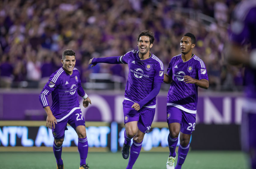ORLANDO, FL - APRIL 3: Kaka #10, Rafael Ramos #27, and Tommy Redding #29 of Orlando City SC celebrate after the opening goal against the Portland Timbers at the Citrus Bowl on April 3, 2016 in Orlando, Florida. (Photo by Chris McEniry/Overflow Productions, Inc./Getty Images)