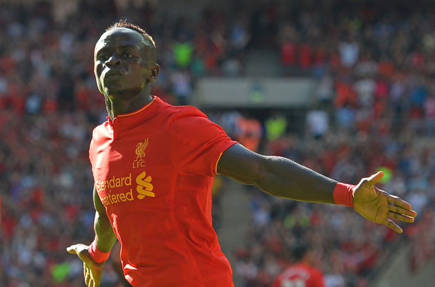 Liverpool's Senegalese midfielder Sadio Mane celebrates after scoring the opening goal of the pre-season International Champions Cup football match between Spanish champions, Barcelona and Liverpool at Wembley stadium in London on August 6, 2016. / AFP / Glyn KIRK (Photo credit should read GLYN KIRK/AFP/Getty Images)