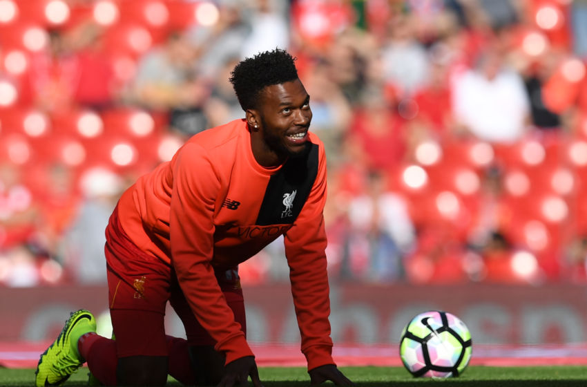 Liverpool's English striker Daniel Sturridge gestures while warming up ahead of the English Premier League football match between Liverpool and Leicester City at Anfield in Liverpool, north west England on September 10, 2016. / AFP / Paul ELLIS / RESTRICTED TO EDITORIAL USE. No use with unauthorized audio, video, data, fixture lists, club/league logos or 'live' services. Online in-match use limited to 75 images, no video emulation. No use in betting, games or single club/league/player publications. / (Photo credit should read PAUL ELLIS/AFP/Getty Images)