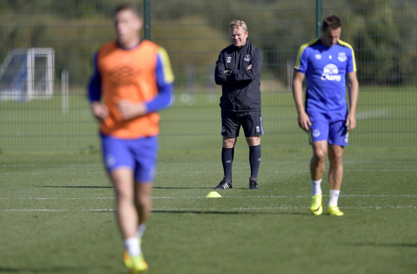 Koeman watches on as his Everton players train.