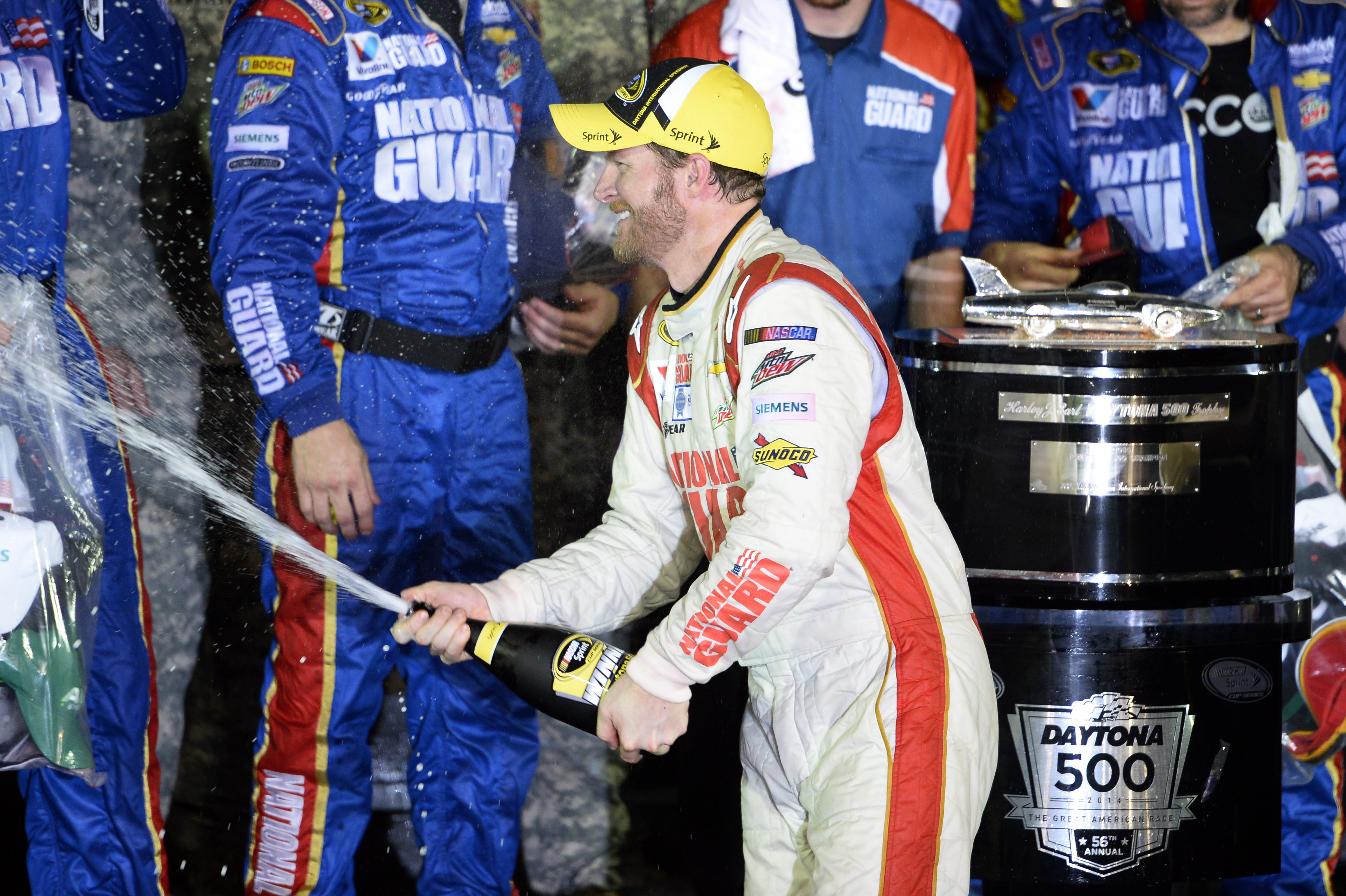 Feb 23, 2014; Daytona Beach, FL, USA; NASCAR Sprint Cup driver Dale Earnhardt Jr (88) celebrates winning the Daytona 500 at Daytona International Speedway. Mandatory Credit: Mike DiNovo-USA TODAY Sports