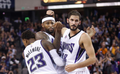 Nov 15, 2014; Sacramento, CA, USA; Sacramento Kings guard Ben McLemore (23), center DeMarcus Cousins (15) and forward Omri Casspi (18) celebrate after the win against the San Antonio Spurs at Sleep Train Arena.The Sacramento Kings defeated the San Antonio Spurs 94-91. Mandatory Credit: Kelley L Cox-USA TODAY Sports