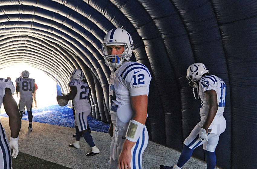 Aug 22, 2015; Indianapolis, IN, USA; Indianapolis Colts quarterback Andrew Luck (12) waits along with other offensive players in the tunnel prior to being introduced for their pre-season game against the Chicago Bears at Lucas Oil Stadium. Mandatory Credit: Thomas J. Russo-USA TODAY Sports