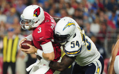 Aug 22, 2015; Glendale, AZ, USA; Arizona Cardinals quarterback Carson Palmer (3) is sacked by San Diego Chargers outside linebacker Melvin Ingram (54) during the first half at University of Phoenix Stadium. Mandatory Credit: Matt Kartozian-USA TODAY Sports