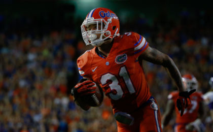 Sep 12, 2015; Gainesville, FL, USA; Florida Gators defensive back Jalen Tabor (31) intercepted the ball and runs it back for a touchdown against the East Carolina Pirates during the second half at Ben Hill Griffin Stadium. Florida Gators defeated the East Carolina Pirates 31-24. Mandatory Credit: Kim Klement-USA TODAY Sports