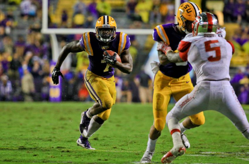 Oct 24, 2015; Baton Rouge, LA, USA; LSU Tigers running back Leonard Fournette (7) runs against the Western Kentucky Hilltoppers during the third quarter of a game at Tiger Stadium. Mandatory Credit: Derick E. Hingle-USA TODAY Sports