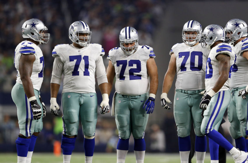 Nov 1, 2015; Arlington, TX, USA; Dallas Cowboys offensive guard La'el Collins (71) and center Travis Frederick (72) and guard Zack Martin (70) during the game against the Seattle Seahawks at AT&T Stadium. Mandatory Credit: Kevin Jairaj-USA TODAY Sports