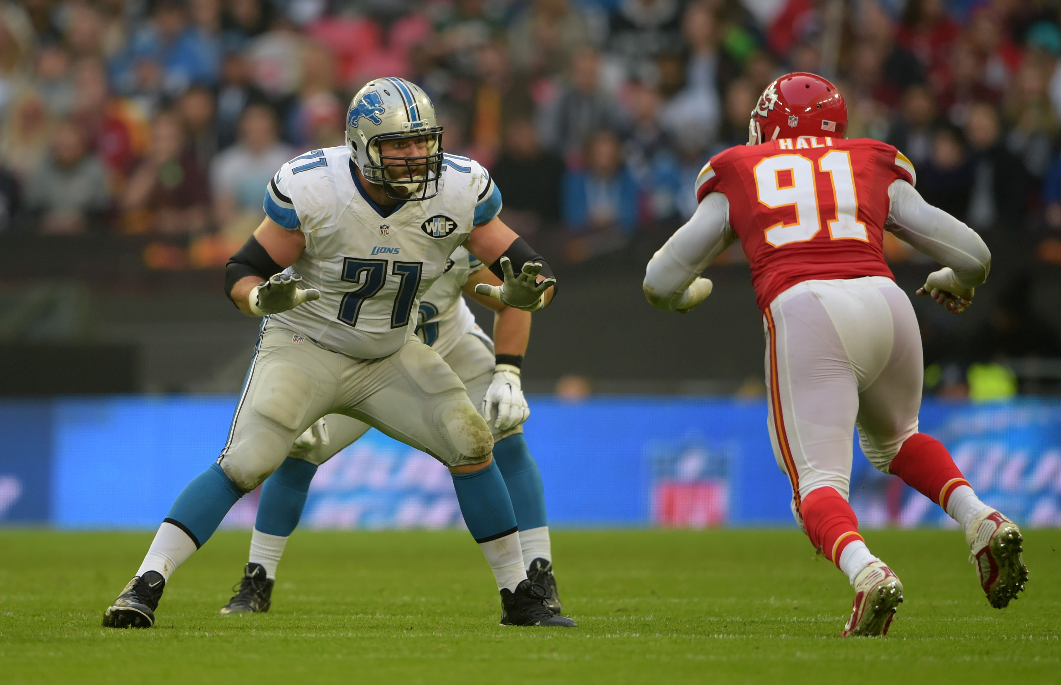 Nov 1, 2015; London, United Kingdom; Detroit Lions tackle Riley Reiff (71) defends against Kansas City Chiefs linebacker Tambi Hali (91) during game 14 of the NFL International Series at Wembley Stadum. Mandatory Credit: Kirby Lee-USA TODAY Sports