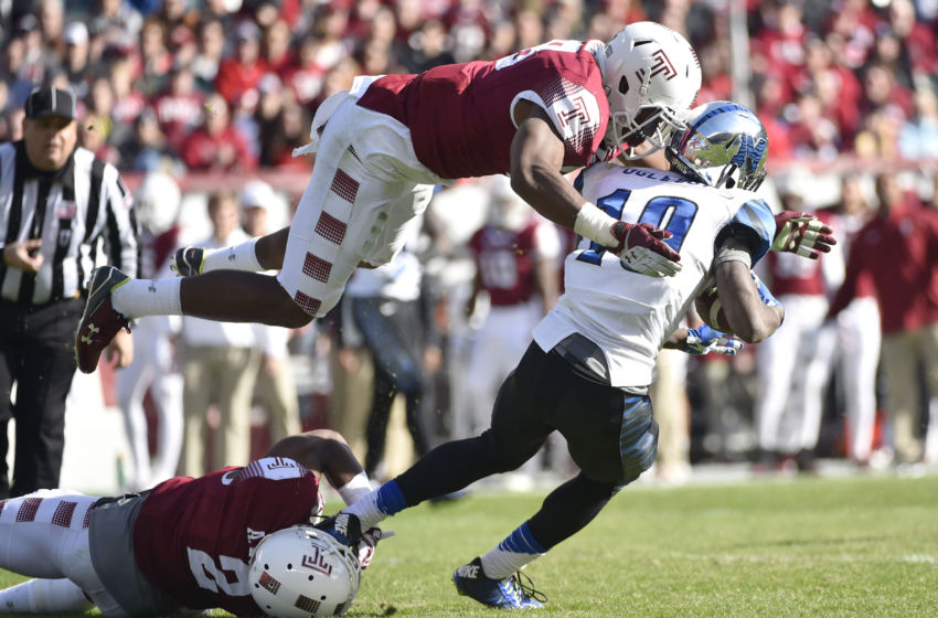 Nov 21, 2015; Philadelphia, PA, USA; Temple Owls defensive lineman Haason Reddick (58) dives to make a tackle on Memphis Tigers wide receiver Jae'lon Oglesby (19) during the first half at Lincoln Financial Field. Mandatory Credit: Derik Hamilton-USA TODAY Sports