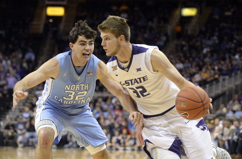 Nov 24, 2015; Kansas City, MO, USA; Kansas State Wildcats forward Dean Wade (32) drives to the basket against North Carolina Tar Heels forward Luke Maye (32) in the first half at Sprint Center. Mandatory Credit: John Rieger-USA TODAY Sports