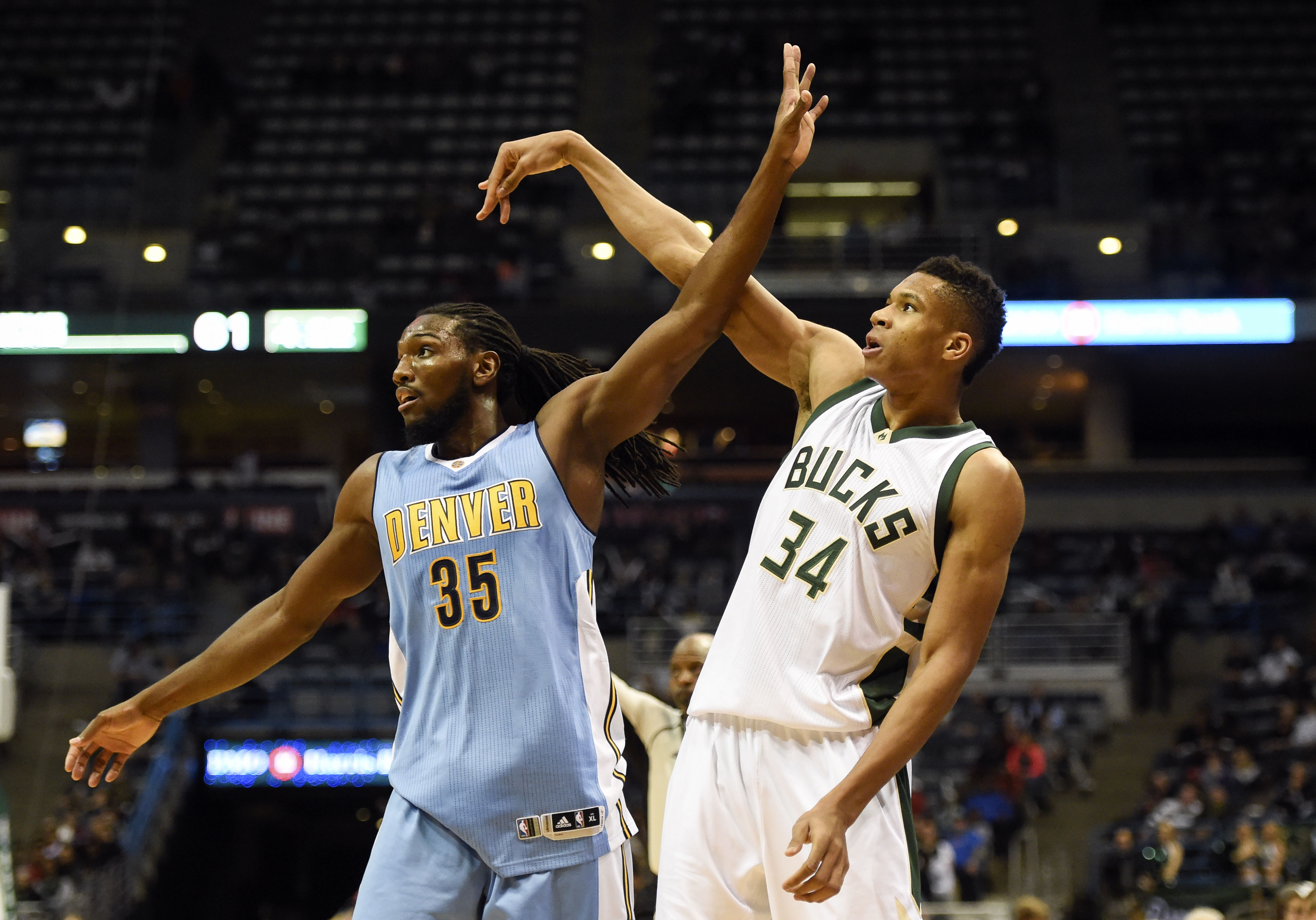 Nov 30, 2015; Milwaukee, WI, USA; Denver Nuggets forward Kenneth Faried (35) watches a shot by Milwaukee Bucks forward Giannis Antetokounmpo (34) in the third quarter at BMO Harris Bradley Center. Mandatory Credit: Benny Sieu-USA TODAY Sports