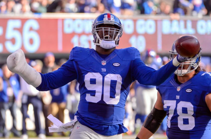Dec 6, 2015; East Rutherford, NJ, USA; New York Giants defensive end Jason Pierre-Paul (90) celebrates after recovering a fumble during the first half against the New York Jets at MetLife Stadium. Mandatory Credit: Robert Deutsch-USA TODAY Sports