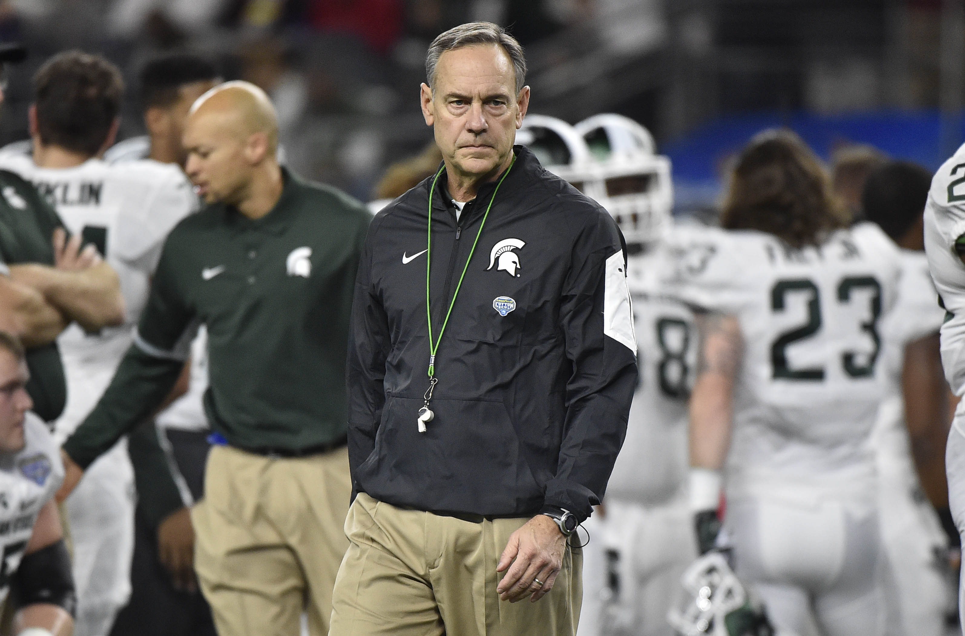 Dec 31, 2015; Arlington, TX, USA; Michigan State Spartans head coach Mark Dantonio looks on during warm-ups prior to the game Alabama Crimson Tide in the 2015 CFP semifinal at the Cotton Bowl at AT&T Stadium. Mandatory Credit: Jerome Miron-USA TODAY Sports