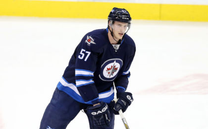 Jan 14, 2016; Winnipeg, Manitoba, CAN; Winnipeg Jets defenseman Tyler Myers (57) warms up prior to the game against the Nashville Predators at MTS Centre. Mandatory Credit: Bruce Fedyck-USA TODAY Sports