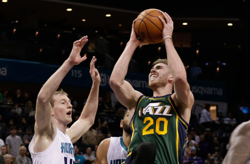 Jan 18, 2016; Charlotte, NC, USA; Utah Jazz forward Gordon Hayward (20) goes up for a shot against Charlotte Hornets center Cody Zeller (40) in the first overtime at Time Warner Cable Arena. The Hornets defeated the Jazz in two overtimes 124-119. Mandatory Credit: Jeremy Brevard-USA TODAY Sports