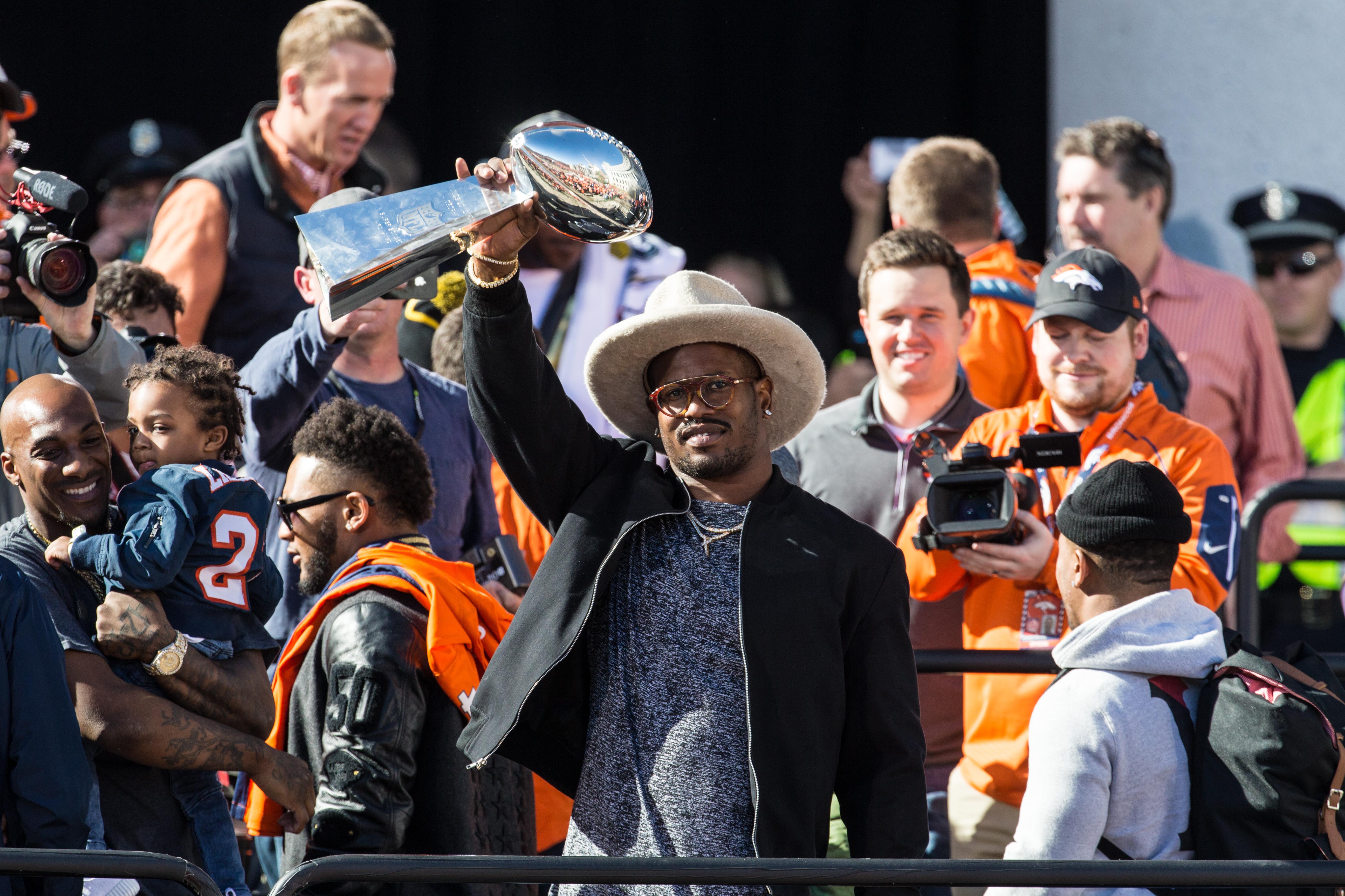 aFeb 9, 2016; Denver, CO, USA; Denver Broncos linebacker Von Miller raises the Vince Lombardi Trophy during the Super Bowl 50 championship parade celebration at Civic Center Park. Mandatory Credit: Isaiah J. Downing-USA TODAY Sports