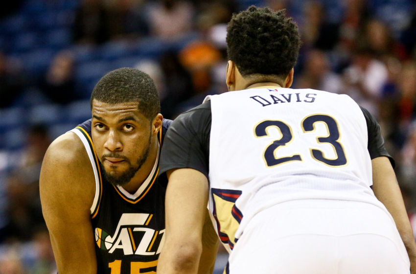 Feb 10, 2016; New Orleans, LA, USA; Utah Jazz forward Derrick Favors (15) and New Orleans Pelicans forward Anthony Davis (23) during the fourth quarter of a game at the Smoothie King Center. The Pelicans defeated the Jazz 100-96. Mandatory Credit: Derick E. Hingle-USA TODAY Sports