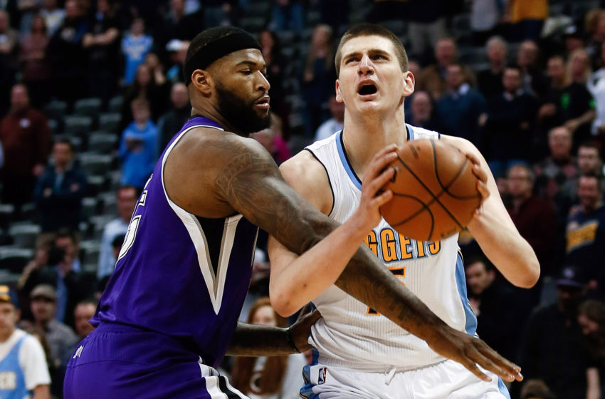 Feb 23, 2016; Denver, CO, USA; Sacramento Kings center DeMarcus Cousins (15) fouls Denver Nuggets center Nikola Jokic (15) in the first quarter at Pepsi Center. Mandatory Credit: Isaiah J. Downing-USA TODAY Sports
