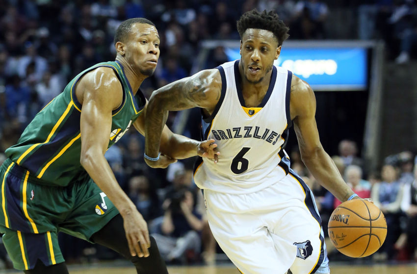 Mar 4, 2016; Memphis, TN, USA; Memphis Grizzlies guard Mario Chalmers (6) dribbles around Utah Jazz guard Rodney Hood (5) at FedExForum. Memphis defeated Utah 94-88. Mandatory Credit: Nelson Chenault-USA TODAY Sports