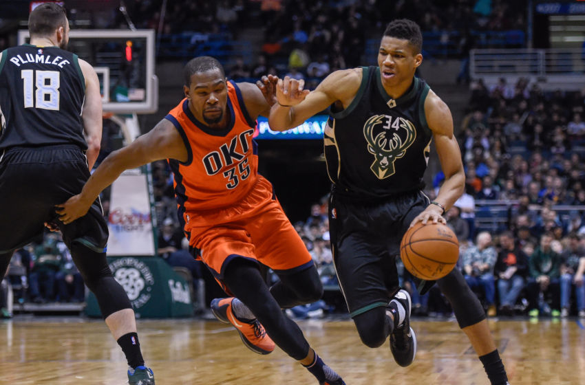 Mar 6, 2016; Milwaukee, WI, USA; Milwaukee Bucks forward Giannis Antetokounmpo (34) drives for the basket against Oklahoma City Thunder forward Kevin Durant (35) in the third quarter at BMO Harris Bradley Center. The Thunder beat the Bucks 104-96. Mandatory Credit: Benny Sieu-USA TODAY Sports