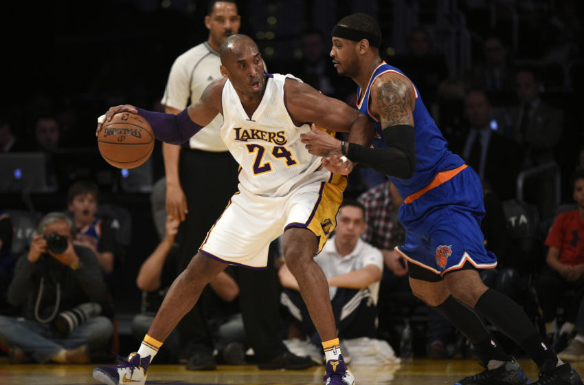 Mar 13, 2016; Los Angeles, CA, USA; Los Angeles Lakers forward Kobe Bryant (24) posts up on New York Knicks forward Carmelo Anthony (7) during the first quarter at Staples Center. Mandatory Credit: Kelvin Kuo-USA TODAY Sports