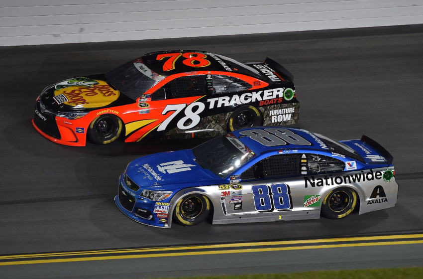Jul 2, 2016; Daytona Beach, FL, USA; NASCAR Sprint Cup Series driver Dale Earnhardt Jr. (88) and Martin Truex Jr. (78) race during the Coke Zero 400 at Daytona International Speedway. Mandatory Credit: Jasen Vinlove-USA TODAY Sports