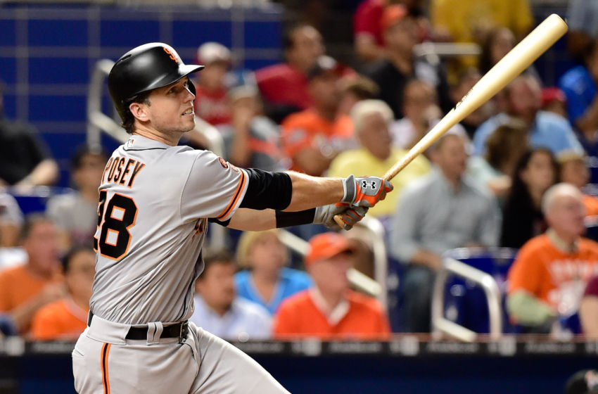 Aug 8, 2016; Miami, FL, USA; San Francisco Giants catcher Buster Posey (28) connects for an RBI double during the fifth inning against the Miami Marlins at Marlins Park. Mandatory Credit: Steve Mitchell-USA TODAY Sports