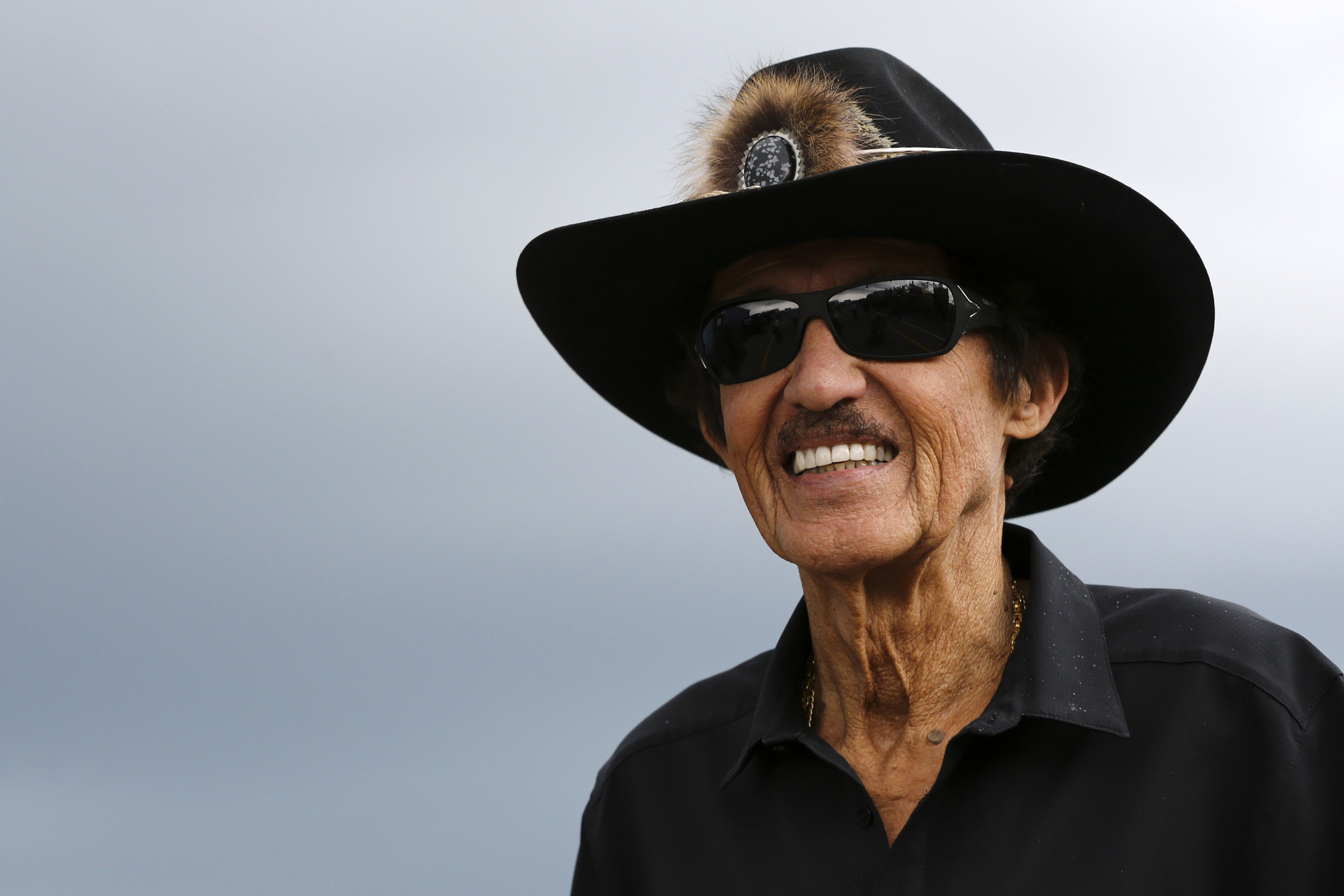 Aug 27, 2016; Brooklyn, MI, USA; NASCAR team owner Richard Petty walks through the garage during practice for the Pure Michigan 400 at Michigan International Speedway. Mandatory Credit: Aaron Doster-USA TODAY Sports
