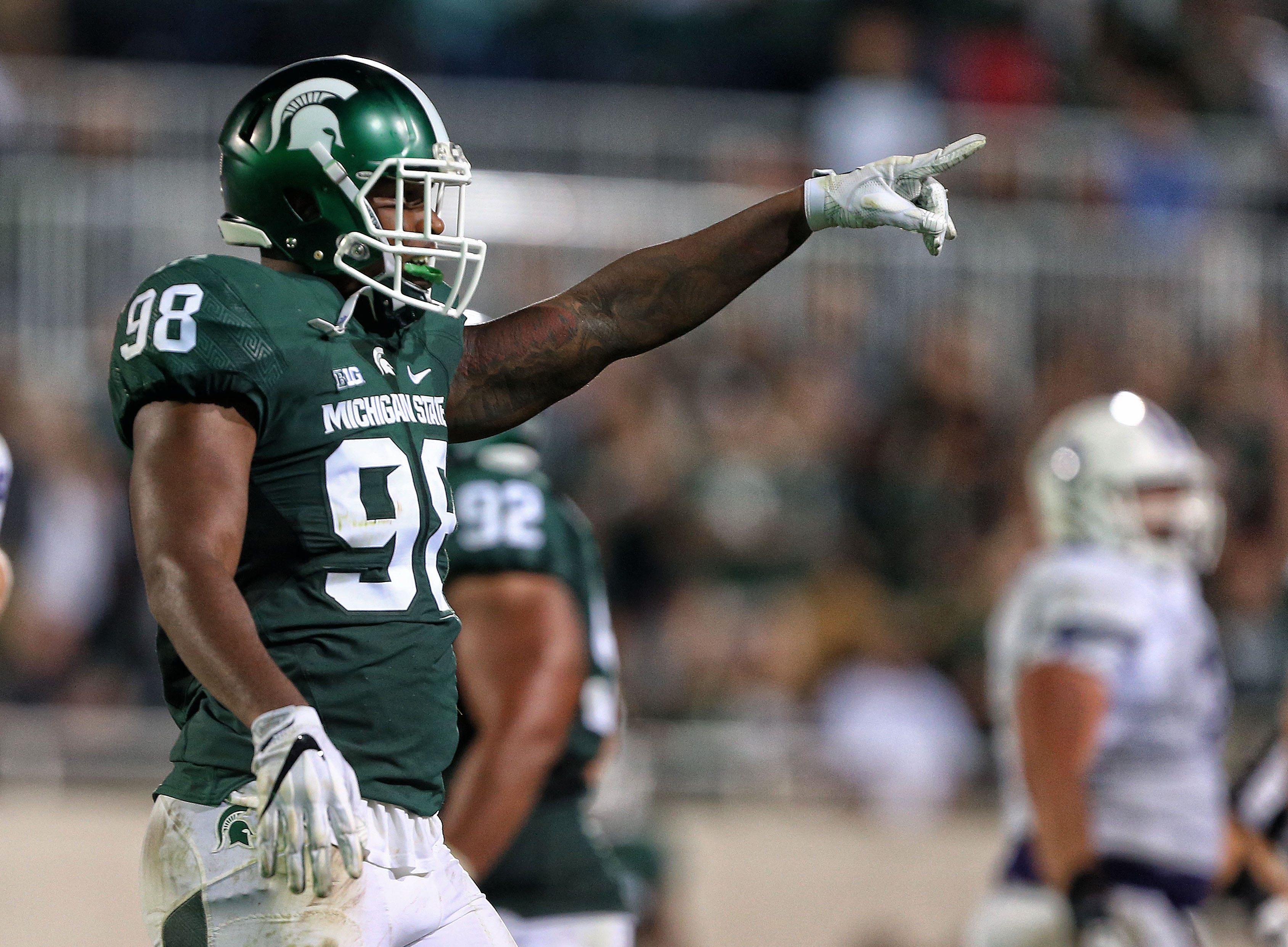 Sep 2, 2016; East Lansing, MI, USA; Michigan State Spartans defensive end Demetrius Cooper (98) gestures to the sideline during the second half against the Furman Paladins at Spartan Stadium. Mandatory Credit: Mike Carter-USA TODAY Sports