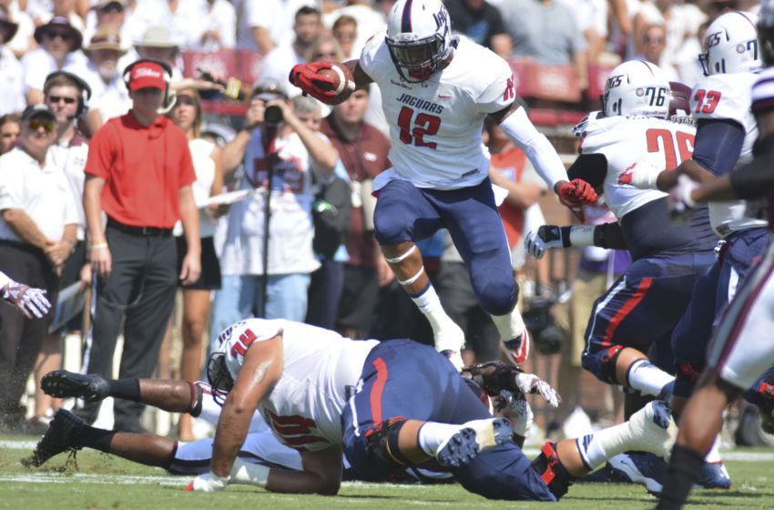 Sep 3, 2016; Starkville, MS, USA; South Alabama Jaguars tight end Gerald Everett (12) runs the ball during the first quarter of the game against the Mississippi State Bulldogs at Davis Wade Stadium. Mandatory Credit: Matt Bush-USA TODAY Sports
