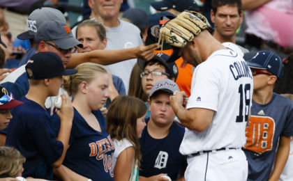 Aug 30, 2016; Detroit, MI, USA; Detroit Tigers center fielder Tyler Collins (18) signs autographs prior to the game against the Chicago White Sox at Comerica Park. Mandatory Credit: Rick Osentoski-USA TODAY Sports