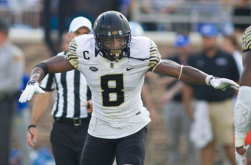 Sep 10, 2016; Durham, NC, USA; Wake Forest Demon Deacons linebacker Marquel Lee (8) celebrates after a sack during the third quarter against the Duke Blue Devils at Wallace Wade Stadium. Wake defeated Duke 24-14. Mandatory Credit: Jeremy Brevard-USA TODAY Sports