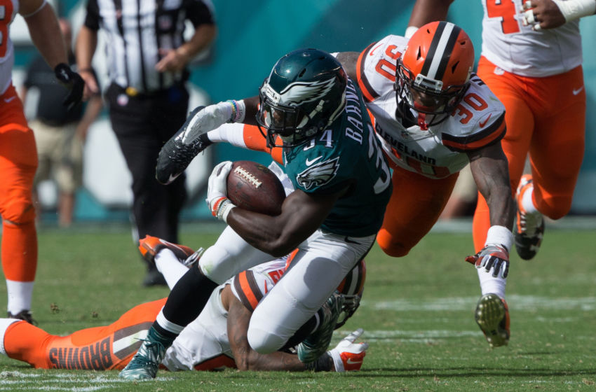 Sep 11, 2016; Philadelphia, PA, USA; Philadelphia Eagles running back Kenjon Barner (34) is tackled by Cleveland Browns free safety Derrick Kindred (30) at Lincoln Financial Field. The Eagles won 29-10. Mandatory Credit: Bill Streicher-USA TODAY Sports