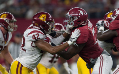 Sep 3, 2016; Arlington, TX, USA; Alabama Crimson Tide offensive lineman Cam Robinson (74) blocks USC Trojans linebacker Uchenna Nwosu (42) during the game at AT&T Stadium. Alabama defeats USC 52-6. Mandatory Credit: Jerome Miron-USA TODAY Sports