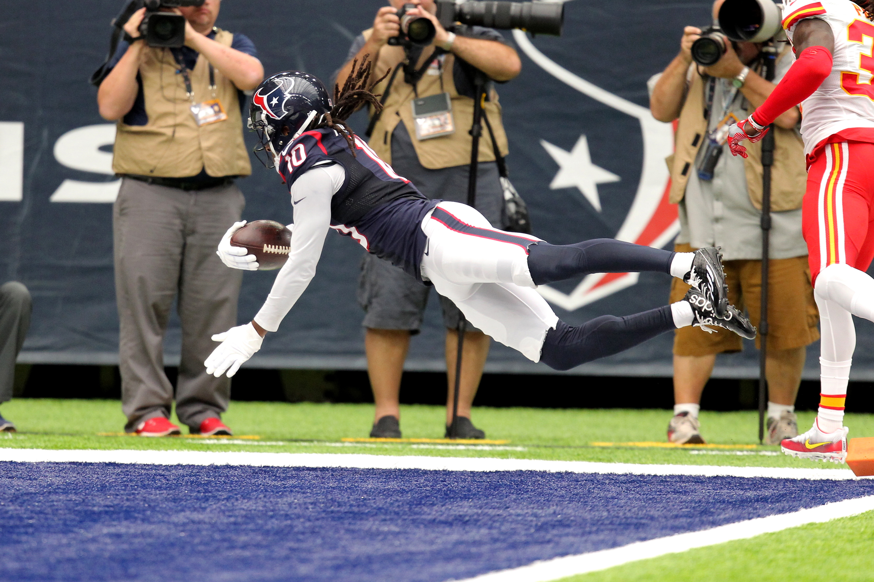 Sep 18, 2016; Houston, TX, USA; Houston Texans wide receiver DeAndre Hopkins (10) dives across the goal line for a touchdown during the first quarter against the Kansas City Chiefs at NRG Stadium. Mandatory Credit: Erik Williams-USA TODAY Sports