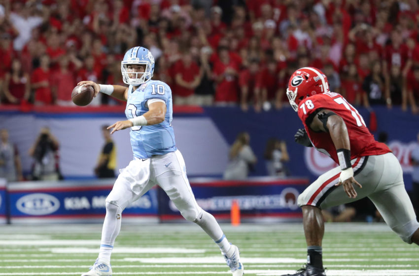 Sep 3, 2016; Atlanta, GA, USA; North Carolina Tar Heels quarterback Mitch Trubisky (10) looks to pass during the 2016 Chick-Fil-A Kickoff game against the Georgia Bulldogs at Georgia Dome. Georgia won 33-24. Mandatory Credit: Jason Getz-USA TODAY Sports
