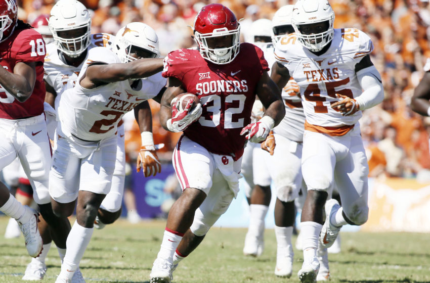 Oct 8, 2016; Dallas, TX, USA; Oklahoma Sooners running back Samaje Perine (32) runs the ball against the Texas Longhorns in the second quarter at Cotton Bowl. Mandatory Credit: Tim Heitman-USA TODAY Sports
