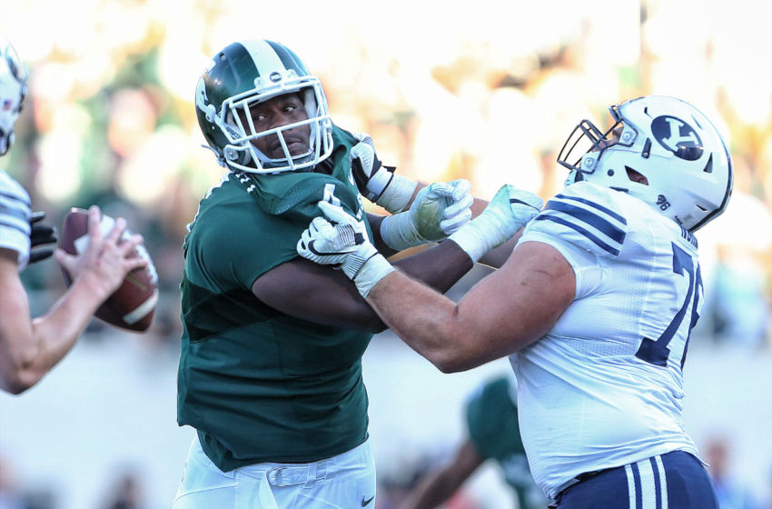 Oct 8, 2016; East Lansing, MI, USA; Michigan State Spartans defensive lineman Malik McDowell (4) is blocked by Brigham Young Cougars offensive lineman Tuni Kanuch (78) during the second half of a game at Spartan Stadium. Mandatory Credit: Mike Carter-USA TODAY Sports