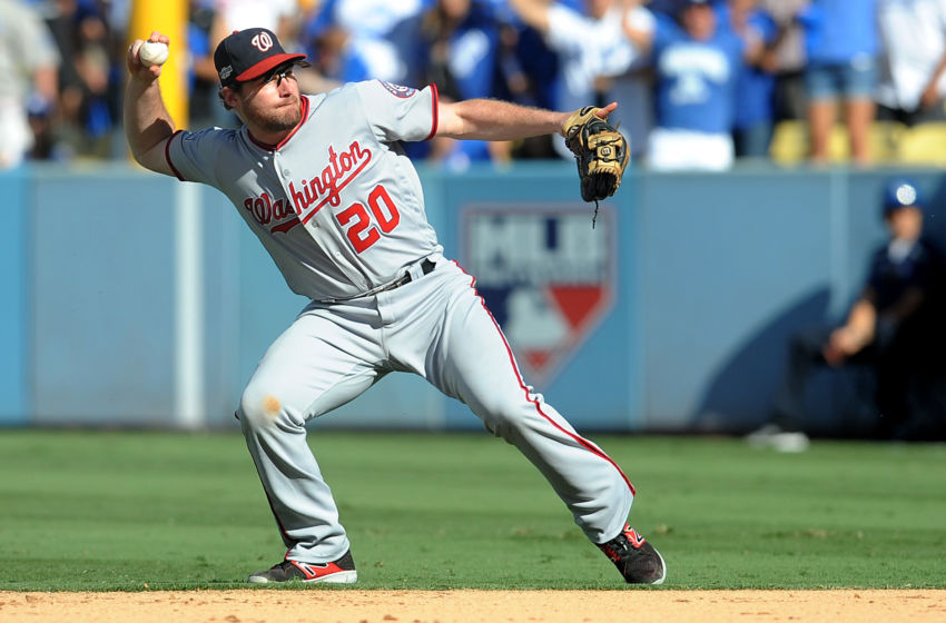 Oct 10, 2016; Los Angeles, CA, USA; Washington Nationals second baseman Daniel Murphy (20) throws to first base during the fifth inning against the Washington Nationals in game three of the 2016 NLDS playoff baseball series at Dodger Stadium. Mandatory Credit: Gary A. Vasquez-USA TODAY Sports