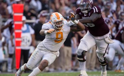 Oct 8, 2016; College Station, TX, USA; Tennessee Volunteers defensive end Derek Barnett (9) and Texas A&M Aggies offensive lineman Avery Gennesy (65) in action during the game at Kyle Field. The Aggies defeat the Volunteers 45-38 in overtime. Mandatory Credit: Jerome Miron-USA TODAY Sports