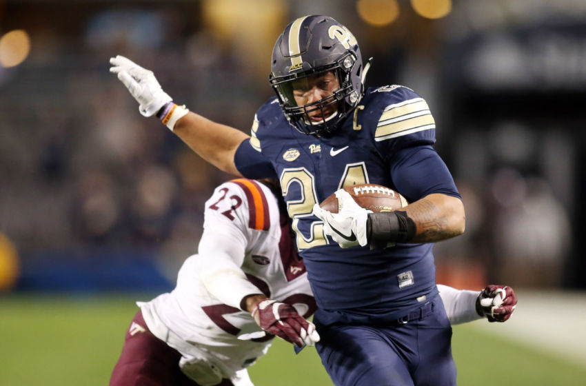 Oct 27, 2016; Pittsburgh, PA, USA; Pittsburgh Panthers running back James Conner (24) rushes the ball past Virginia Tech Hokies linebacker Terrell Edmunds (22) during the second half at Heinz Field. Virginia Tech won 39-36. Mandatory Credit: Charles LeClaire-USA TODAY Sports