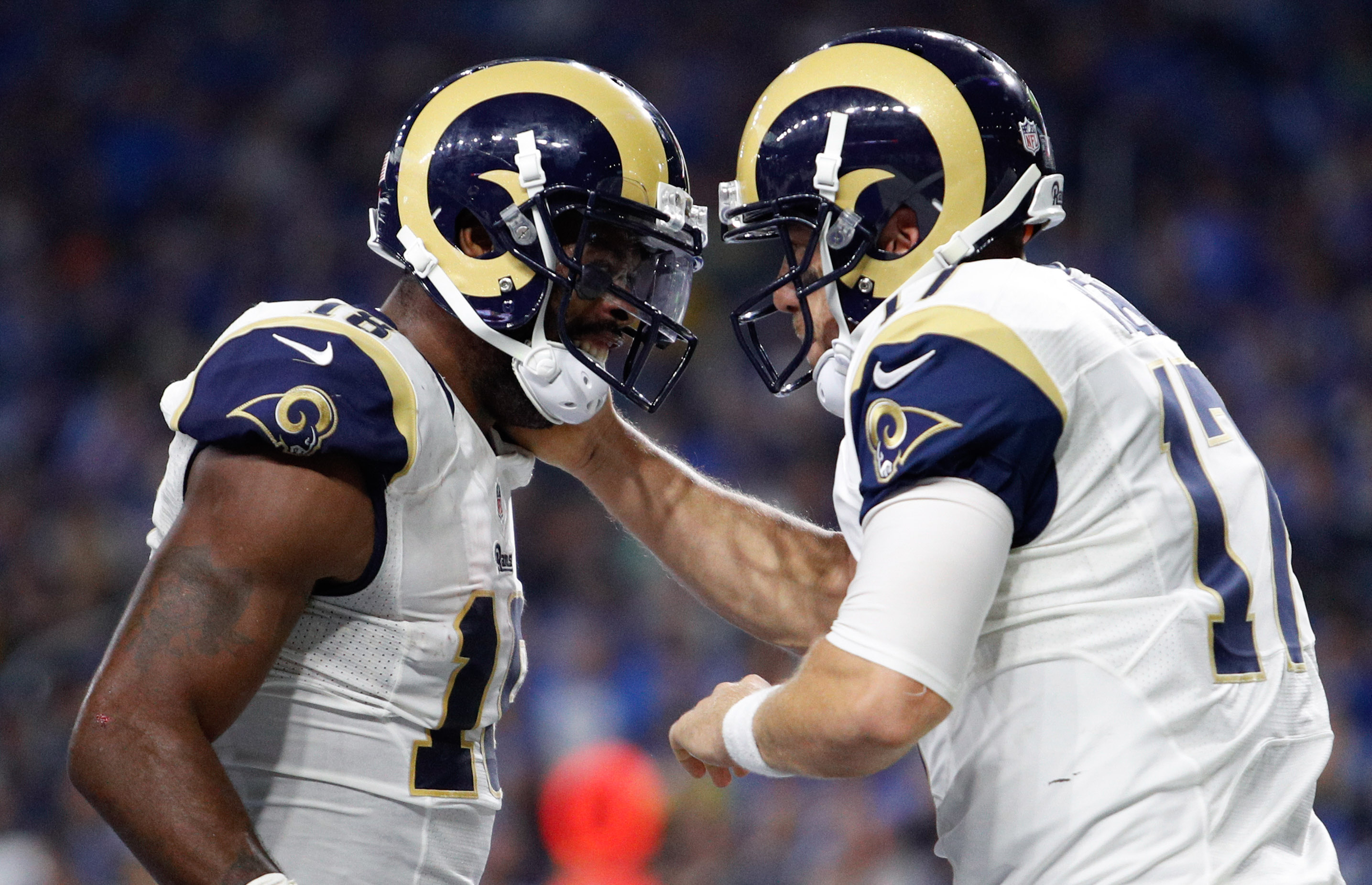 Oct 16, 2016; Detroit, MI, USA; Los Angeles Rams wide receiver Kenny Britt (18) celebrates with quarterback Case Keenum (17) after scoring a touchdown during the fourth quarter against the Detroit Lions at Ford Field. Lions won 31-28. Mandatory Credit: Raj Mehta-USA TODAY Sports