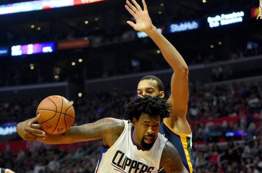 Oct 30, 2016; Los Angeles, CA, USA; Utah Jazz center Rudy Gobert (27) fouls Los Angeles Clippers center DeAndre Jordan (6) in the first half of the game at Staples Center. Clippers won 88-75. Mandatory Credit: Jayne Kamin-Oncea-USA TODAY Sports