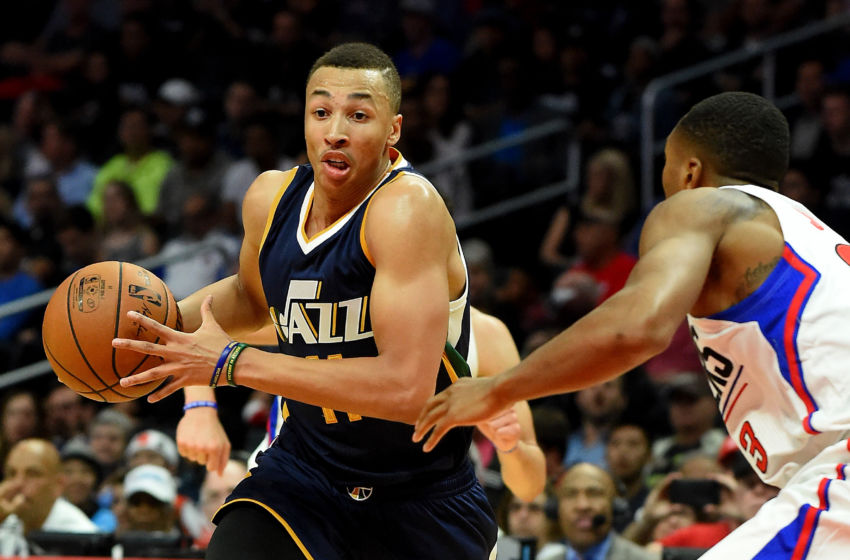 Oct 30, 2016; Los Angeles, CA, USA; Utah Jazz guard Dante Exum (11) drives to the basket against Los Angeles Clippers forward Wesley Johnson (33) in the second half of the game at Staples Center. Clippers won 88-75. Mandatory Credit: Jayne Kamin-Oncea-USA TODAY Sports