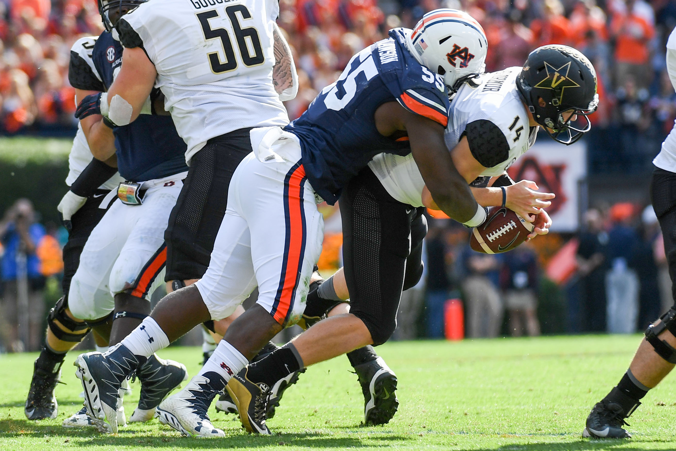 Nov 5, 2016; Auburn, AL, USA; Auburn Tigers defensive lineman Carl Lawson (55) sacks Vanderbilt Commodores quarterback Kyle Shurmur (14) during the fourth quarter at Jordan Hare Stadium. Auburn won 23-16. Mandatory Credit: Shanna Lockwood-USA TODAY Sports