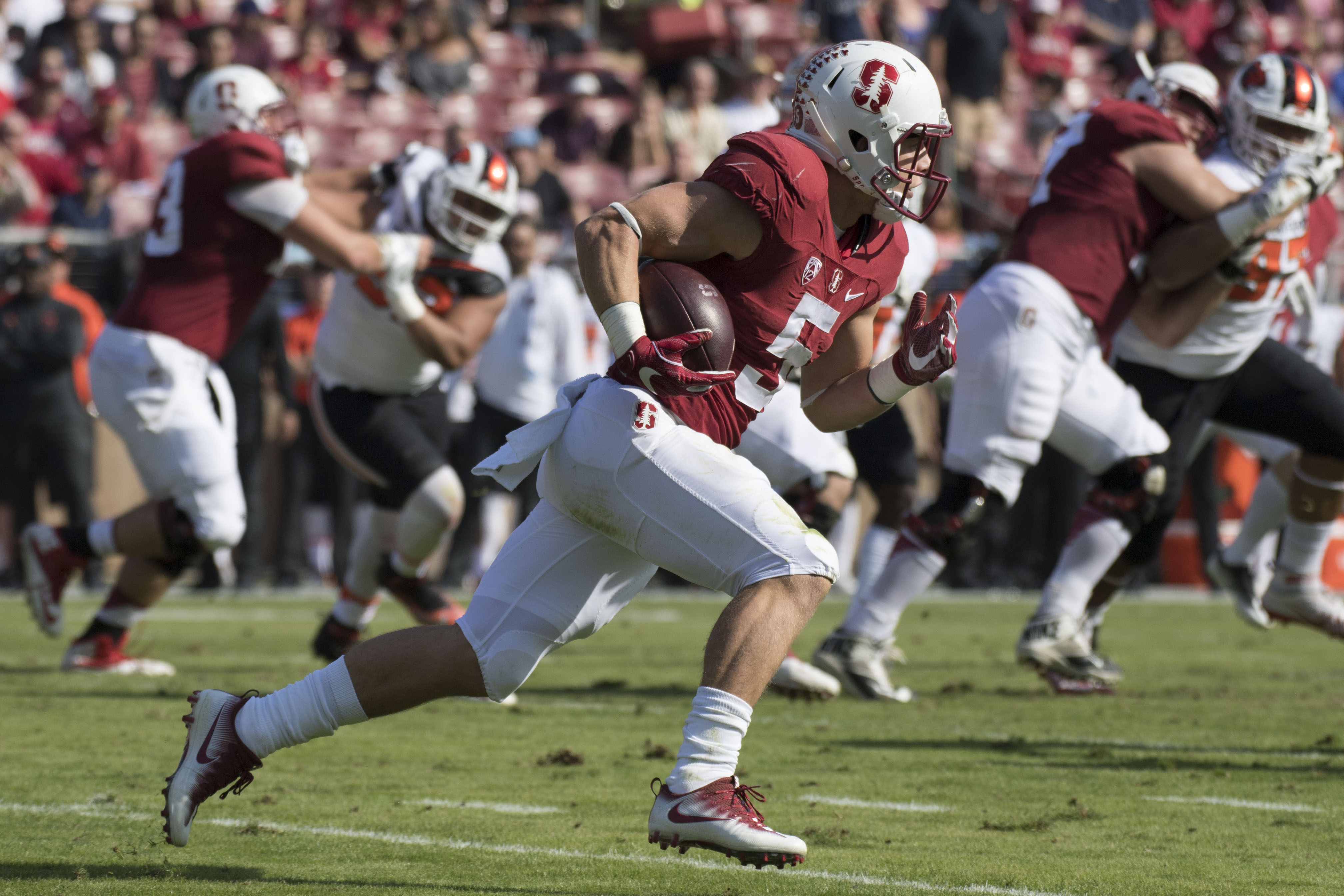 November 5, 2016; Stanford, CA, USA; Stanford Cardinal running back Christian McCaffrey (5) runs with the football against the Oregon State Beavers during the first quarter at Stanford Stadium. Mandatory Credit: Kyle Terada-USA TODAY Sports
