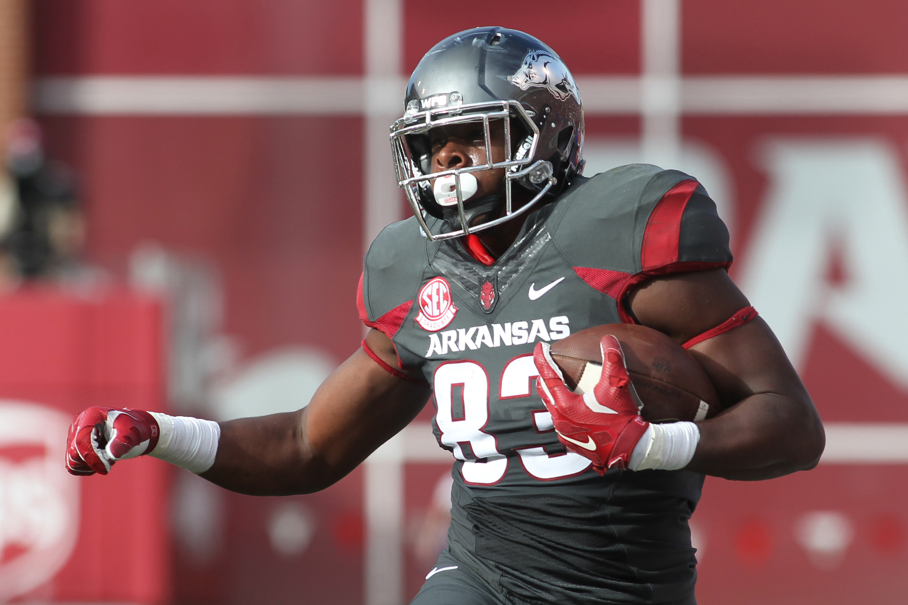 Nov 5, 2016; Fayetteville, AR, USA; Arkansas Razorbacks tight end Jeremy Sprinkle (83) runs after a catch in the second quarter against the Florida Gators at Donald W. Reynolds Razorback Stadium. Mandatory Credit: Nelson Chenault-USA TODAY Sports