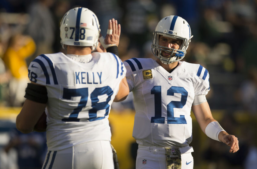 Nov 6, 2016; Green Bay, WI, USA; Indianapolis Colts quarterback Andrew Luck (12) high fives center Ryan Kelly (78) during warmups prior to the game against the Green Bay Packers at Lambeau Field. Mandatory Credit: Jeff Hanisch-USA TODAY Sports